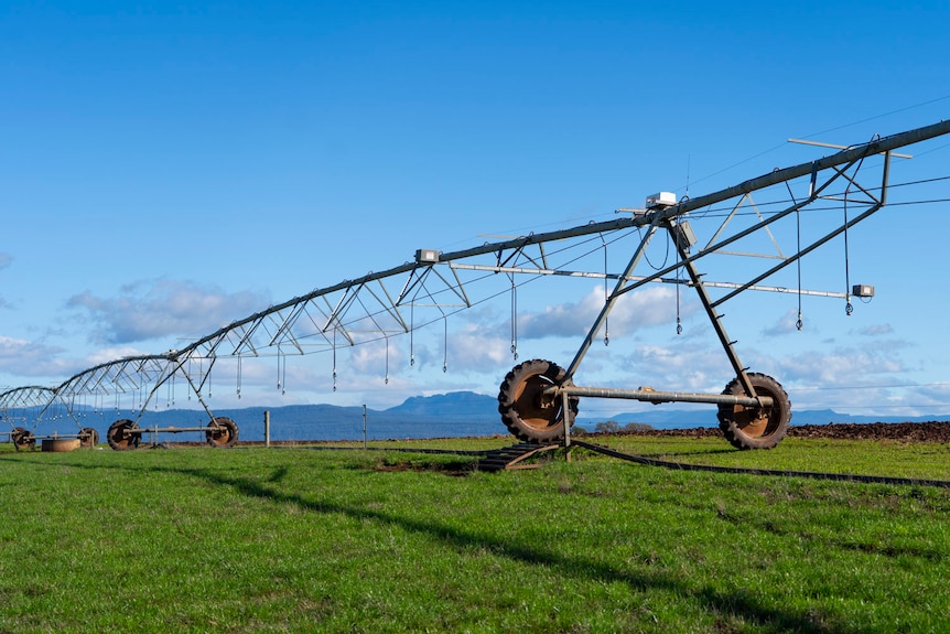 green fields with a irrigation pivot