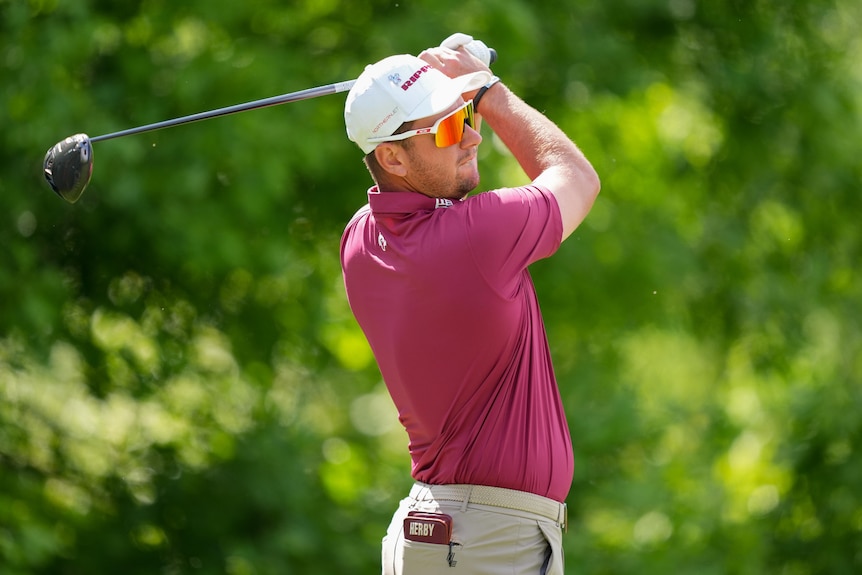 Lucas Herbert hits a shot