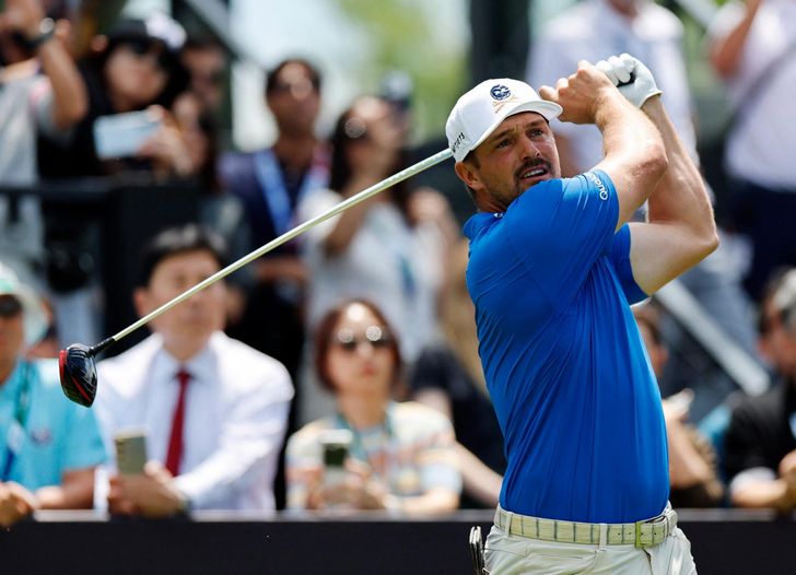 Bryson DeChambeau of the United States hits a tee shot during the first round of LIV Golf Korea at Asiad Country Club in the southeastern city of Busan, Thursday. Reuters-Yonhap
