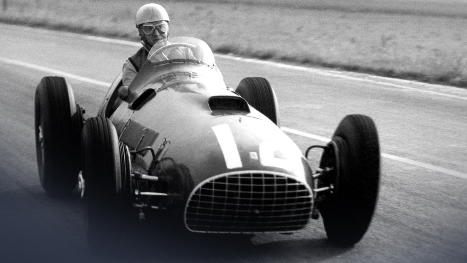 Alberto Ascari at the wheel of a Ferrari