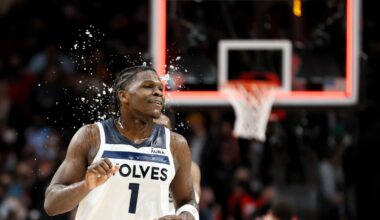 Anthony Edwards #1 of the Minnesota Timberwolves is doused with water after beating the Portland Trail Blazers 109-107 at Moda Center on January 25, 2022 in Portland, Oregon.