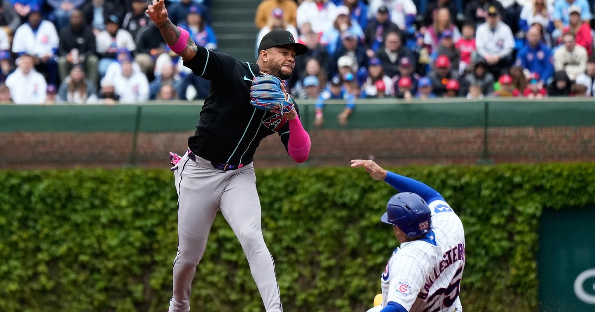 Busch stars as the surging Cubs beat the Diamondbacks 8-4 for their 5th consecutive win
