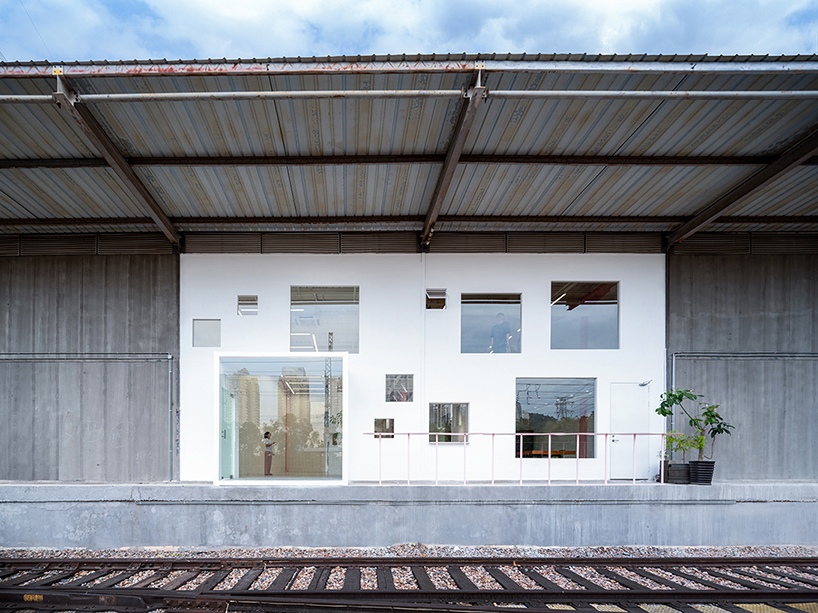 layered transparent walls transform former railway warehouse in shenzhen - 3