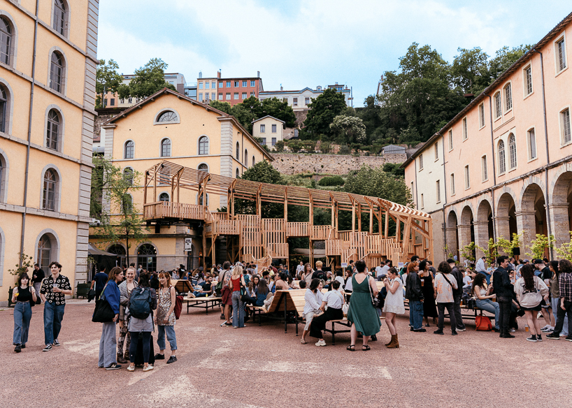 uv lab reimagines arcadia as a layered timber gathering installation in lyon - 3