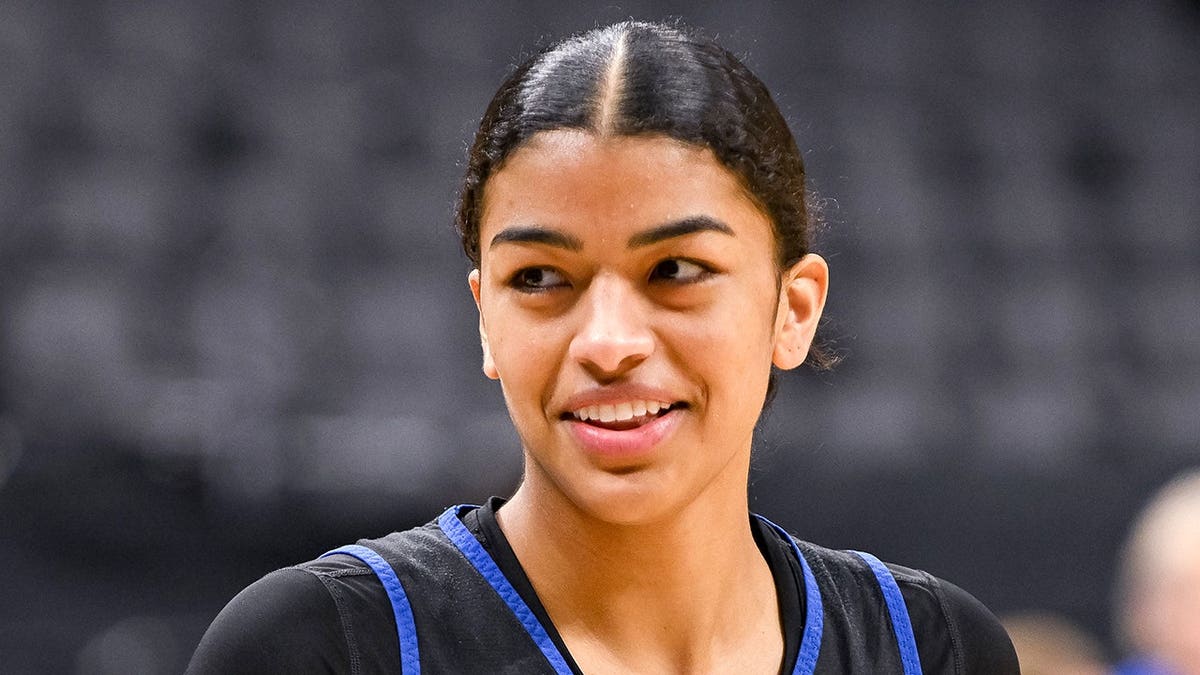 Duke Blue Devils center Arianna Roberson participating in basketball drills at practice.