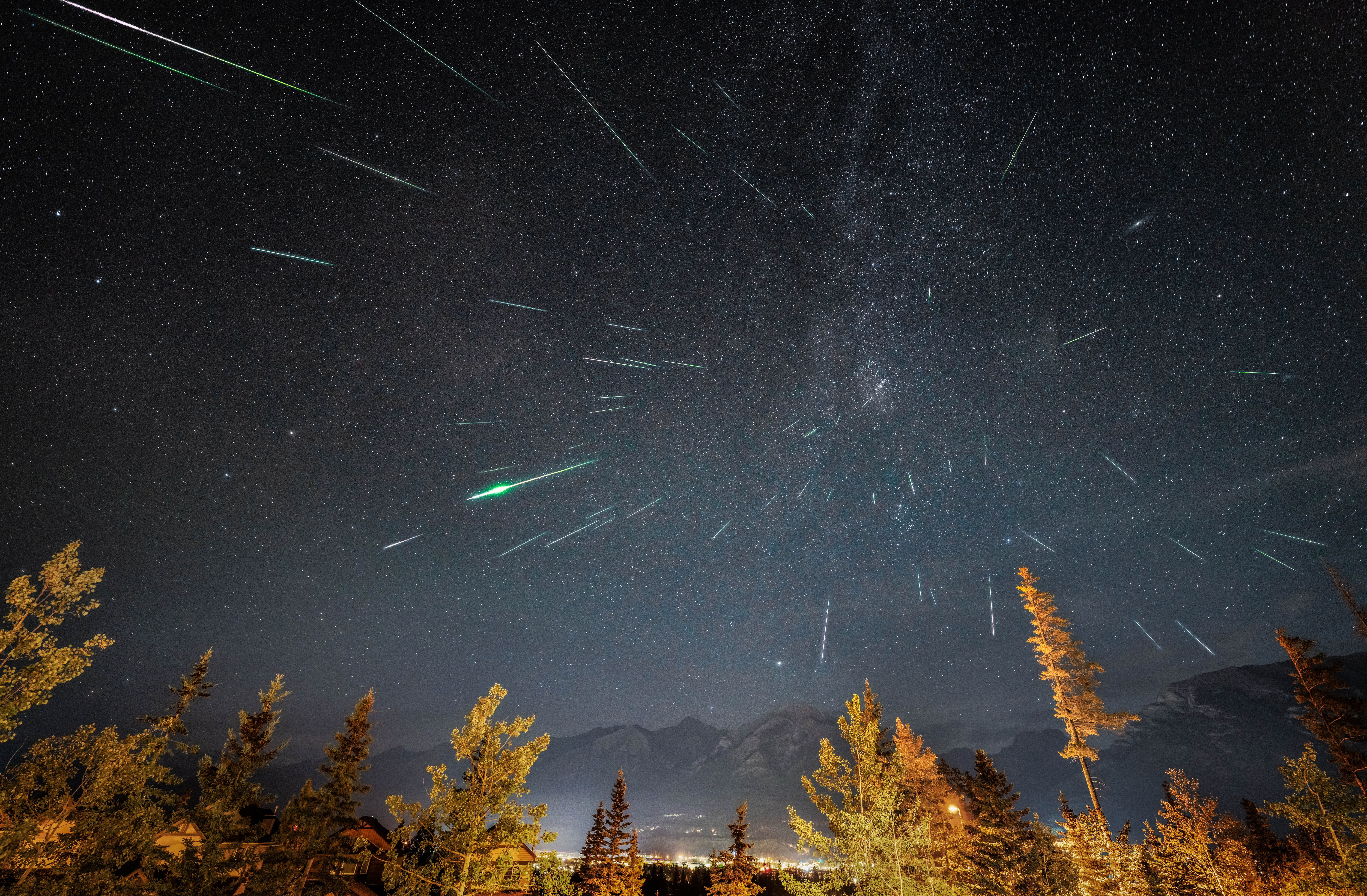 The Perseid meteor shower above Canmore in the Canadian Rockies, Alberta, Canada - stock photo