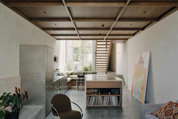 A renovated, bluestone, traditional Victorian cottage conceals an edgy city pad in Fitzroy designed by Olaver Architects. 