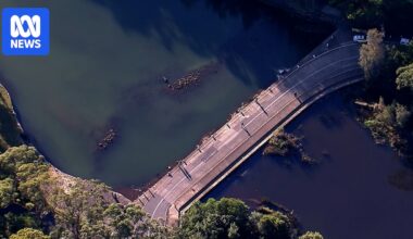 Police divers recover body after car submerged underwater at Sydney's Royal National Park