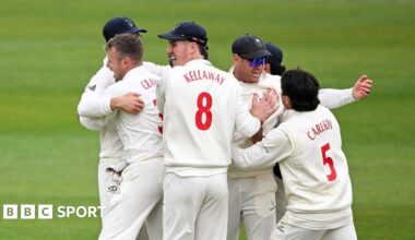 Glamorgan players celebrate a wicket against Hampshire