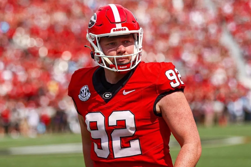 American footballer in red uniform