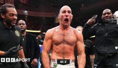 Sean Strickland celebrates beating Khamzat Chimaev