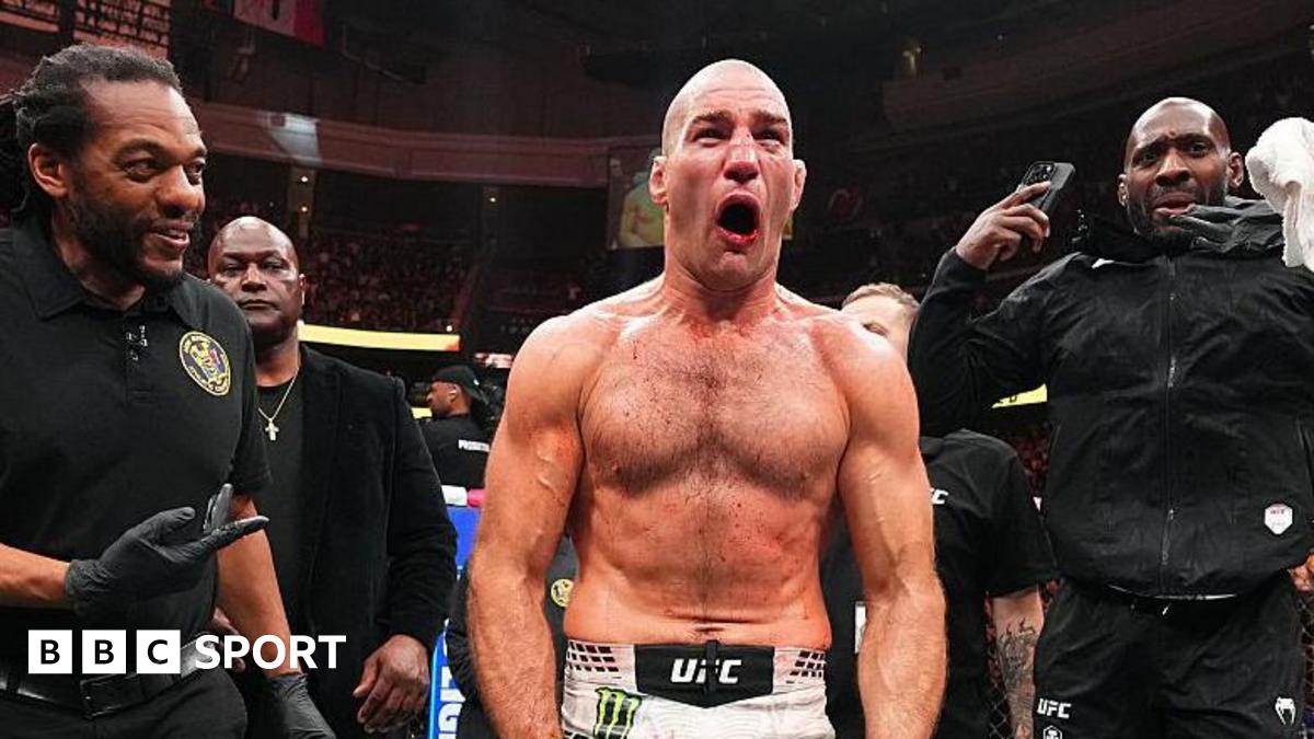 Sean Strickland celebrates beating Khamzat Chimaev