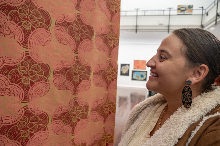 Young woman with large block printed silk panels