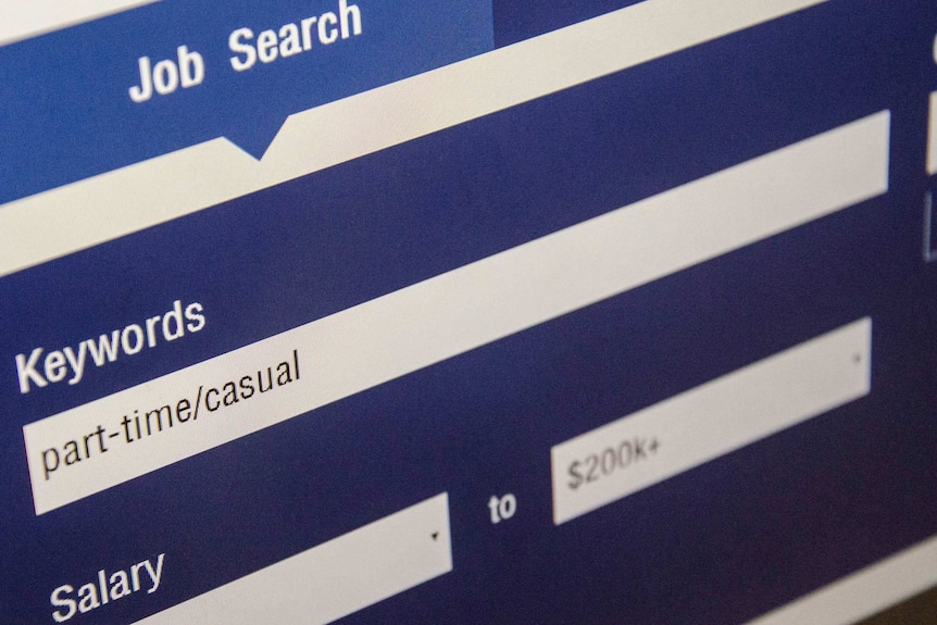 A computer screen shows the job search website Seek