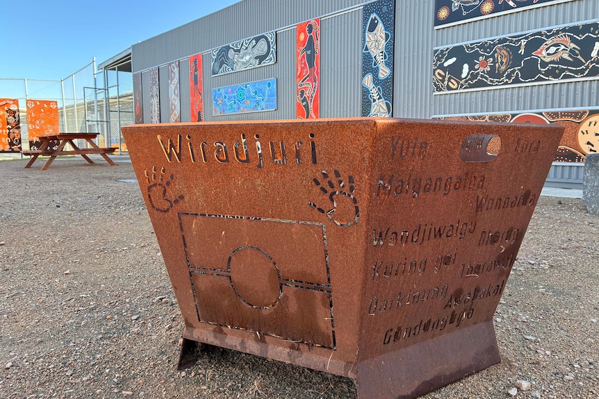 yarning circle with Wiradjuri words on it