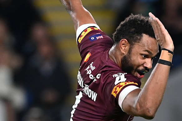 Hamiso Tabuai-Fidow showcases his shark celebration for the Maroons.