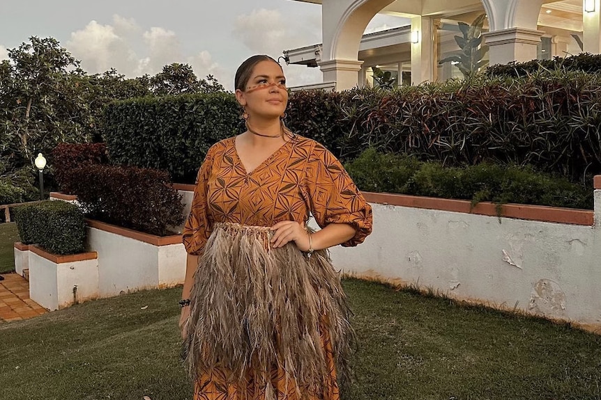 A woman wearing traditional looking clothes