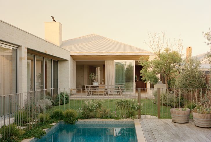 The house settles naturally into its surroundings.