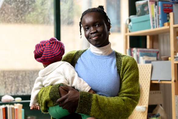 Photographer Atong Atem with her baby.