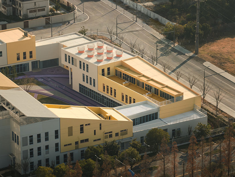 stacked color blocks and layered courtyards form a modular castle-like kindergarten in china - 2