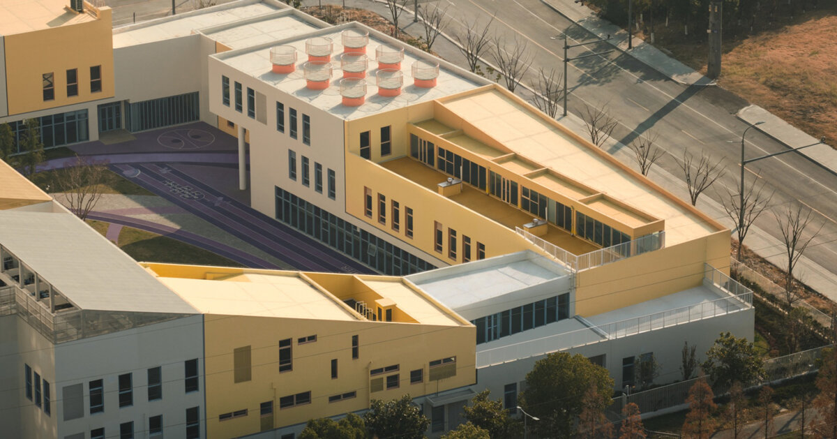 stacked color blocks form a modular castle-like kindergarten in china