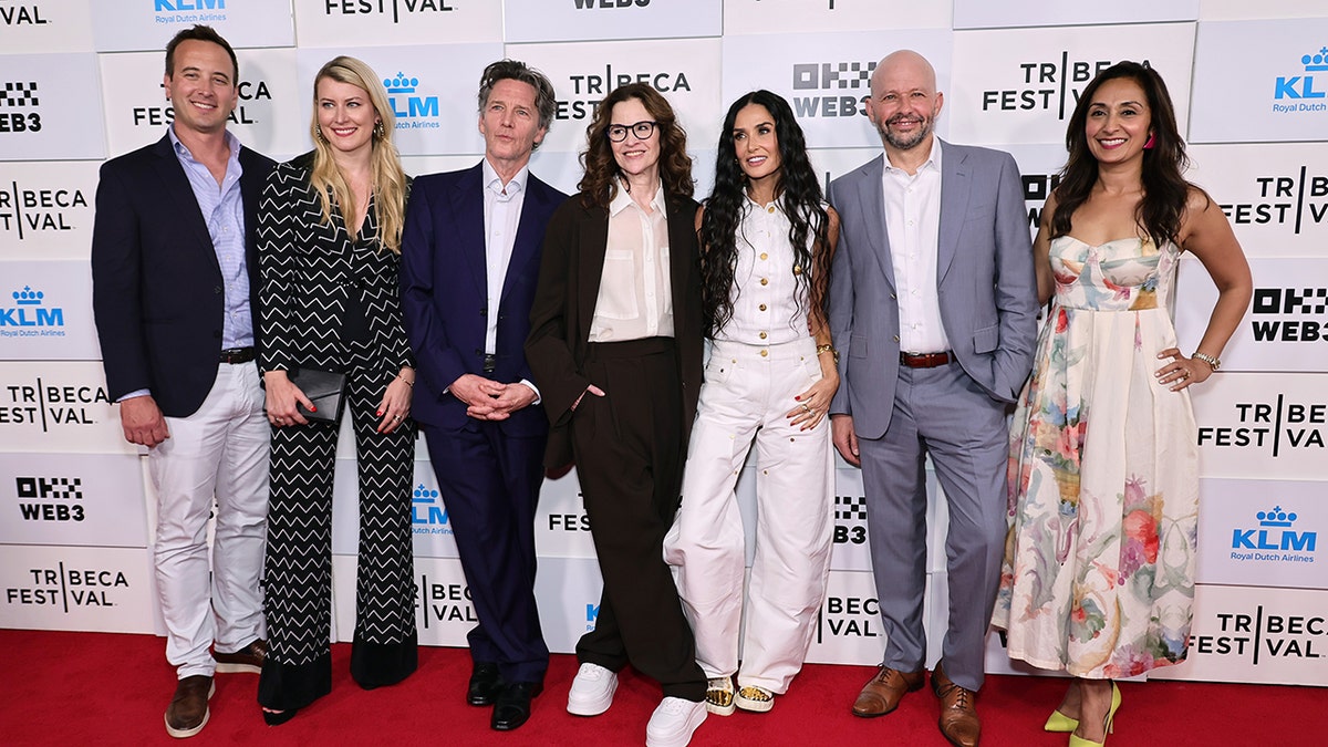 Mike Kelley, Victoria Thompson, Andrew McCarthy, Ally Sheedy, Demi Moore, Jon Cryer and Reena Mehta standing together at the BRATS premiere in New York City