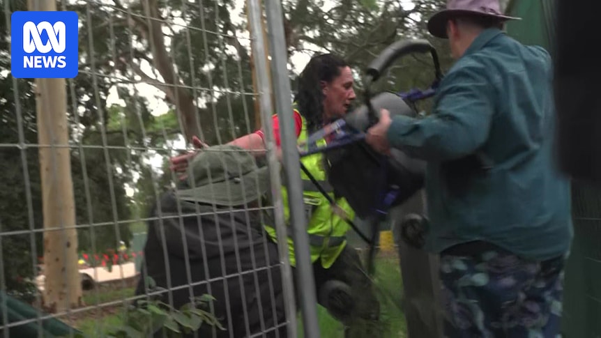 Activist, 78, arrested at North Adelaide Golf Course, as protesters chain themselves to machinery