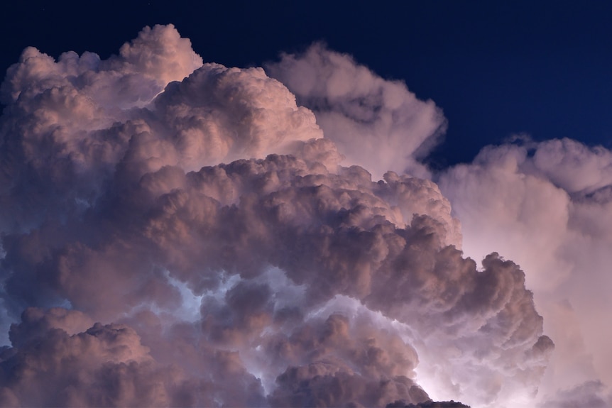 Lightning flickering in stormclouds over WA.