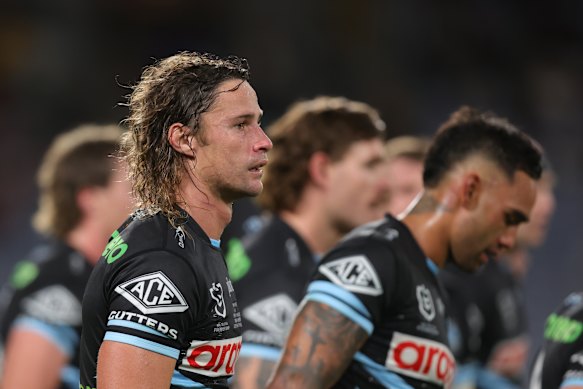 Cronulla players react after conceding another try.