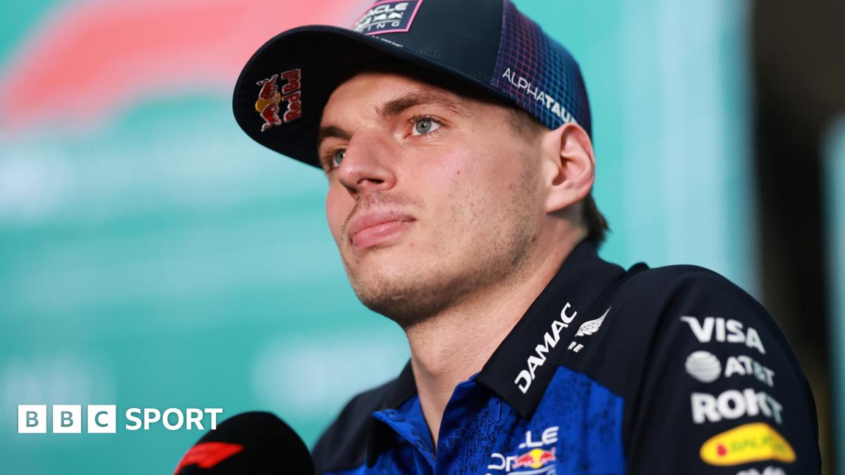 Red Bull's Max Verstappen speaking into an F1-branded microphone at the Miami Grand Prix