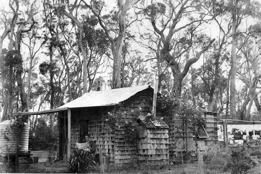 A man in a hut