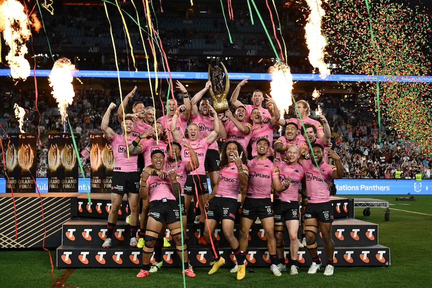 Penrith Panthers lift the NRL Premiership trophy