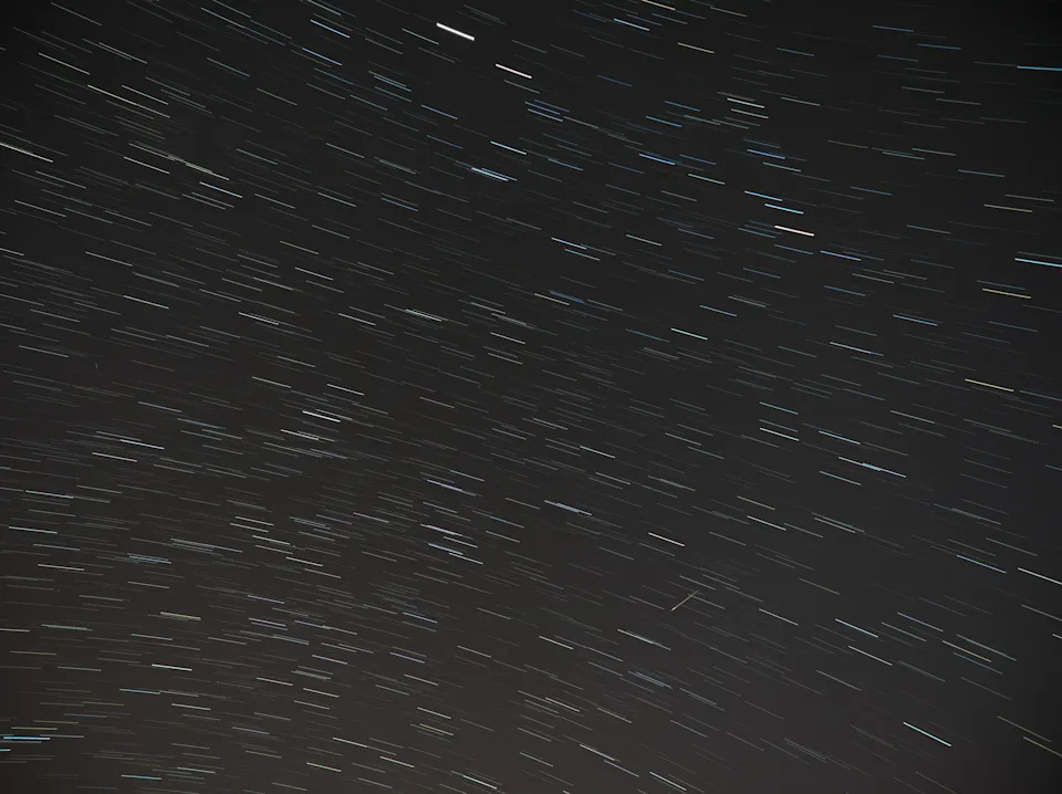 View of star trails and a meteor from the Eta Aquarids meteor shower.