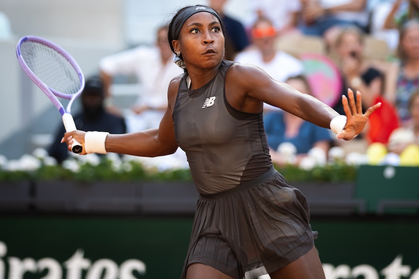 Coco Gauff prepares to play a forehand at the French Open.