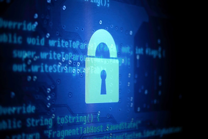 A white lock sign is illuminated over typed computer code on a blue background