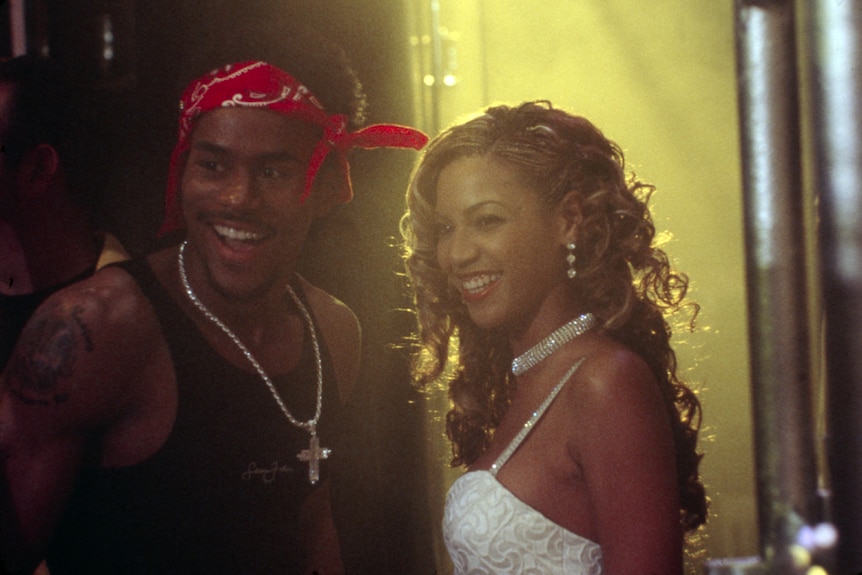 Casey Lee as rapper Blaze and Beyoncé as Carmen laughing in a club