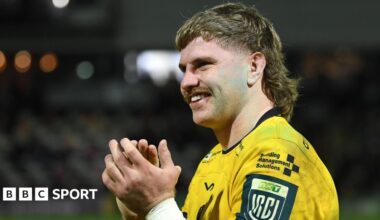 Aaron Wainwright applauds the Dragons fans after victory