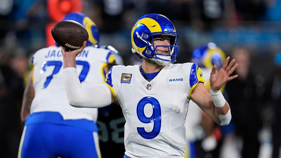 Jan 10, 2026; Charlotte, NC, USA; Los Angeles Rams quarterback Matthew Stafford (9) drops back to pass against the <a class="link " href="https://sports.yahoo.com/nfl/teams/carolina/" data-i13n="sec:content-canvas;subsec:anchor_text;elm:context_link" data-ylk="slk:Carolina Panthers;sec:content-canvas;subsec:anchor_text;elm:context_link;itc:0" data-yga="{"yLinkElement":"context_link","yModuleName":"content-canvas","yLinkText":"Carolina Panthers","ySubModuleName":"anchor_text","yHasCommerce":false}">Carolina Panthers</a> in the first half during the NFC Wild Card Round game at Bank of America Stadium. Mandatory Credit: Jim Dedmon-Imagn Images© Jim Dedmon-Imagn Images