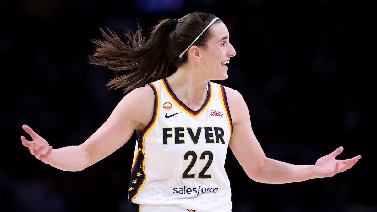 Caitlin Clark arguing for a foul during a basketball game at Crypto.com Arena
