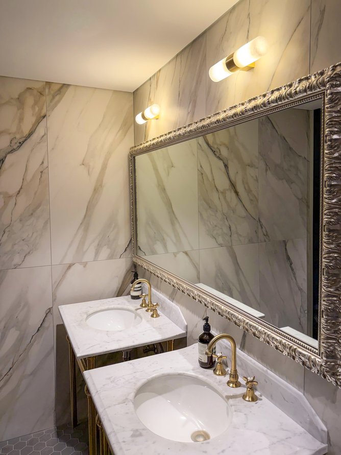 Marble finished bathrooms.