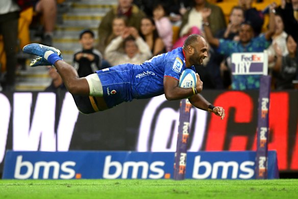 Manasa Mataele of Fijian Drua dives over in one of his three tries of the night.