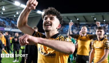 Hull City winger Mohamed Belloumi celebrates in front of his team-mates after their 2-0 win at Millwall