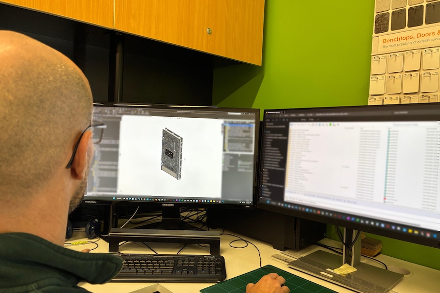 Inmate working on a computer 3D model