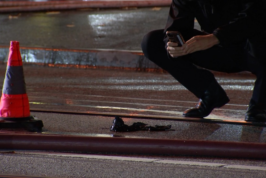 An officer and a burnt shoe.
