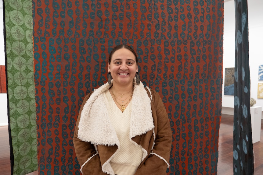 Young woman with large block printed silk panels