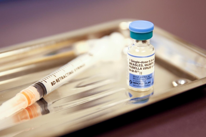 A vial of the measles, mumps, and rubella (MMR) vaccine is pictured