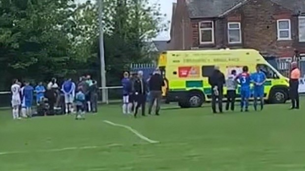 Image of the ambulance arriving at the field for Stephen Ireland.