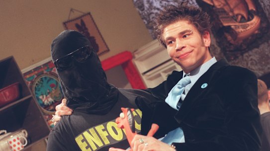 Dylan Lewis on the set of Recovery in 1997 with the Enforcer, played by Angus Sampson.