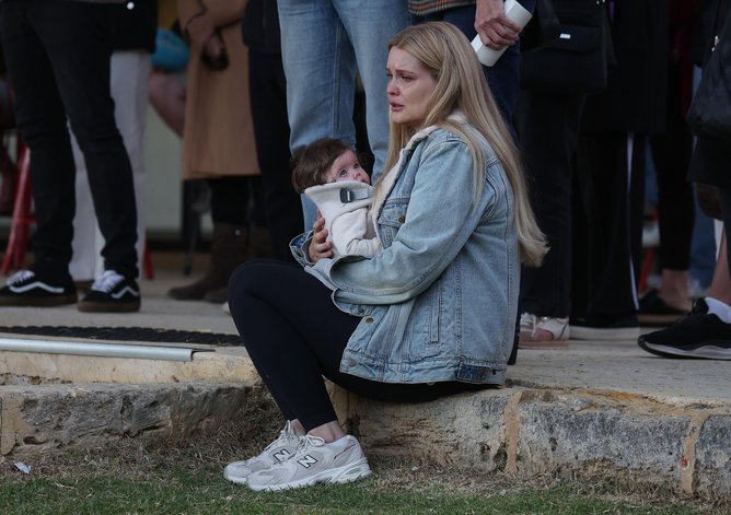 Shirene Mattaboni attends the tribute football game in honour of her late husband.