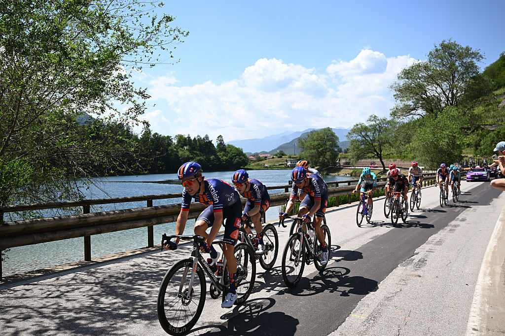 PIEVE DI SOLIGO, ITALY - MAY 28: (L-R) Tim Naberman of Netherlands, Warren Barguil of France and Team Picnic PostNL and a general view of the peloton competing during the 109th Giro d&amp;apos;Italia 2026, Stage 18 a 171km stage from Fai della Paganella to Pieve di Soligo / #UCIWT / on May 28, 2026 in Pieve di Soligo, Italy. (Photo by Tim de Waele/Getty Images)